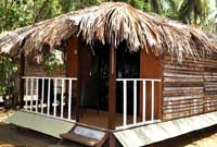 Montego Bay Beach Village Resort,Montego Bay Beach Village - luxury tents,log cabins,restaurant,beach house,Morjim,goa.